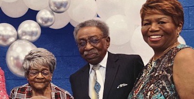 Three people at an event