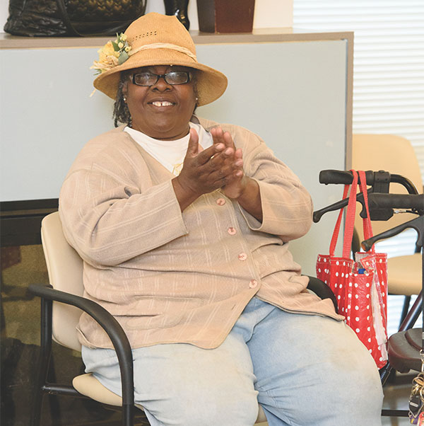Happy person sitting in a chair